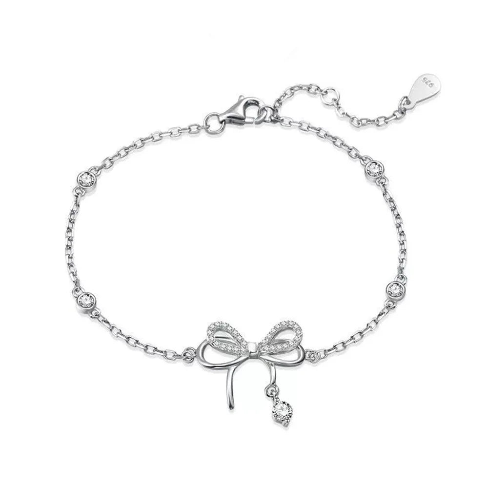 Loja KIONI - Conjunto Clarice - Lacinhos em Prata e Zircônias