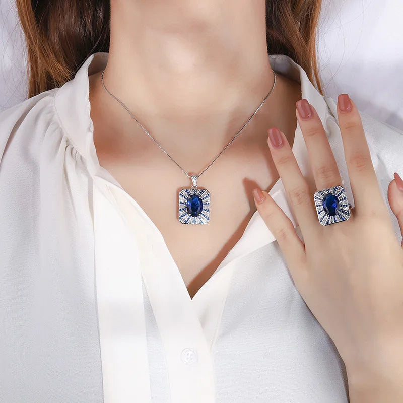 Loja KIONI - Conjunto Naomi - Prata e Zircônias Azuis